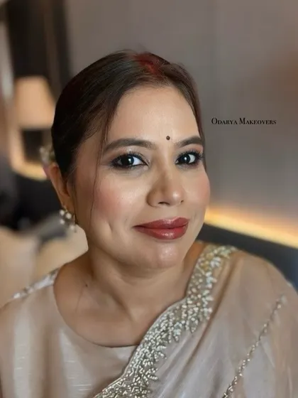A beautiful portrait that captures her grace and the elegance of the makeup.