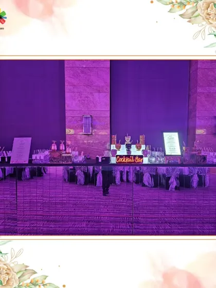 A wide shot of our cocktail bar setup, designed with a mirrored front to reflect the venue's purple ambient lighting. This creates an immersive, visually cohesive experience for guests.