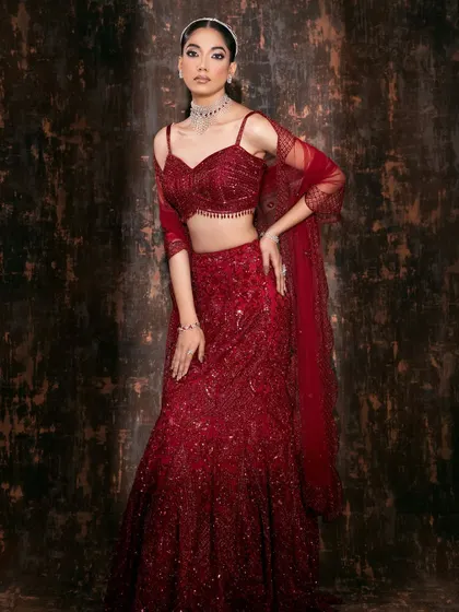 A complete look at a contemporary red lehenga, demonstrating how we capture the outfit's structure and flow for a brand's lookbook.