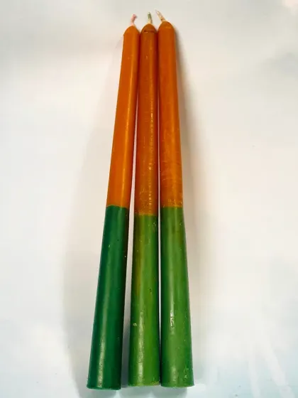 My Road Opener taper candles are made to help clear obstacles from your path. The green and orange colors represent growth and success, helping you move forward with confidence.