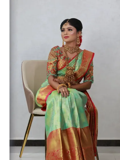 This is the final portrait from a jewellery ad shoot, showcasing a complete South Indian look. The makeup, hair, and styling all come together to create an image of pure elegance for the brand.