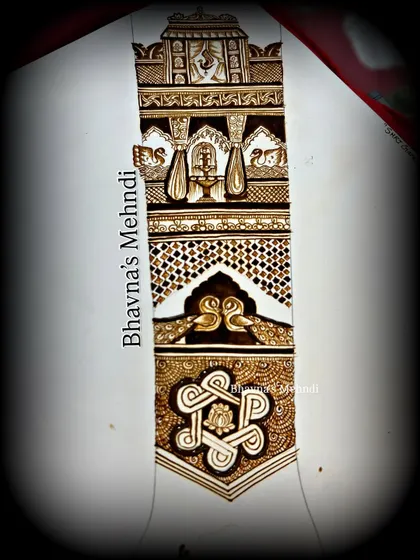 A full design layout on paper, combining different elements like peacocks, elephants, and auspicious symbols.