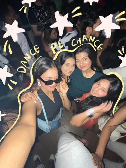 Dance pe chance. A group selfie from a night out, with star doodles to capture the party vibe.