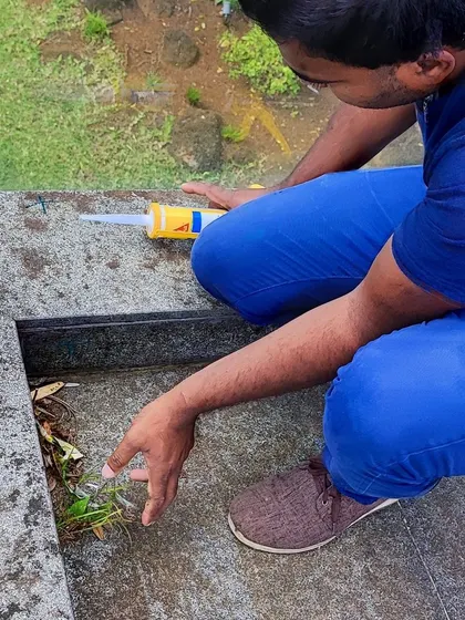 A closer look at the installation of a ground-level Yantra. This helps to balance the foundational energies of the property, creating stability and grounding for the residents.