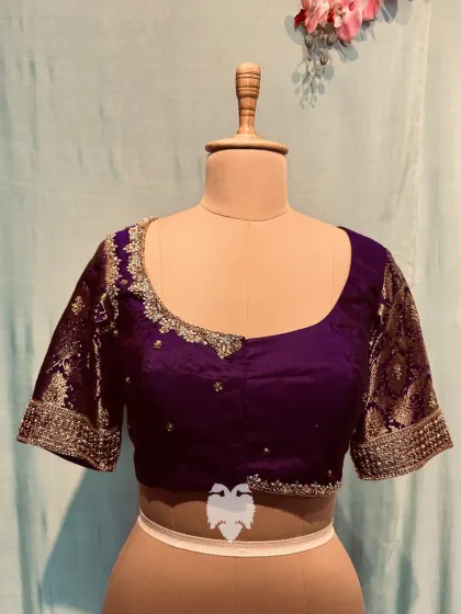 A full view of Nirmala's elegant purple blouse.
