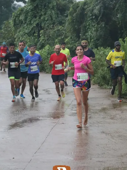 Leading a pack of runners during the race. As a coach and pacer, I love helping others push their limits.