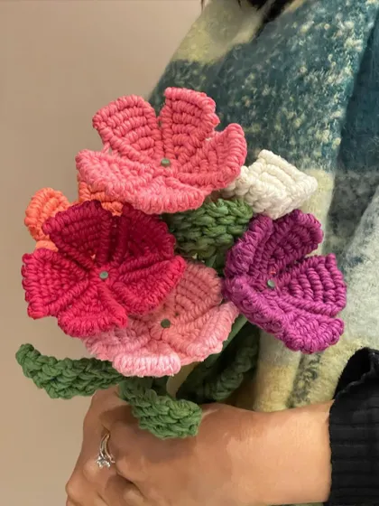 A full bouquet of my handmade macrame flowers. I love holding a finished bouquet; it's so rewarding to see all the colors and textures come together.