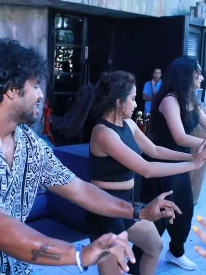 A close-up of the participants learning the moves during a Mixtape workshop. You can see the concentration and the joy as they get into the groove of the Bollywood beats.