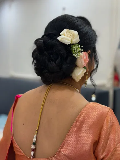 Another view of the floral bun, showing the placement of the flowers.