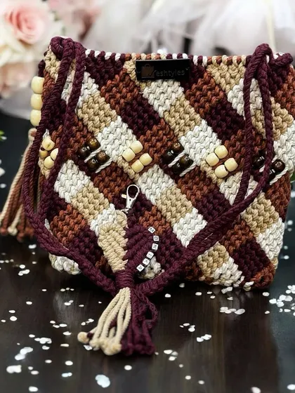 This personalized sling bag with a striped pattern and name beads is a perfect gift for a bridesmaid or a wedding guest.