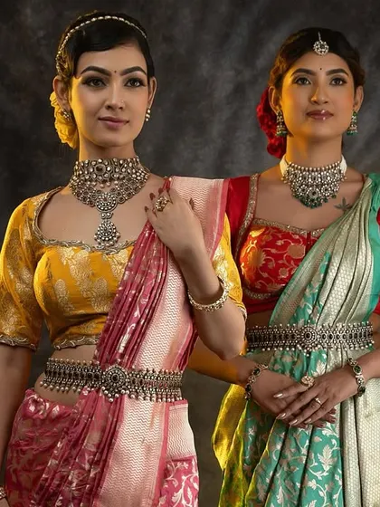 Another shot of the models, highlighting the versatility of our custom blouse designs.