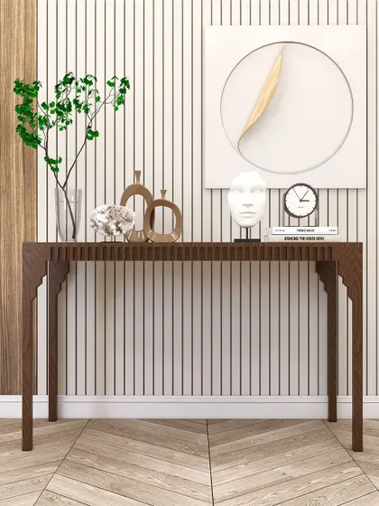 This all-wood console table features intricate carving details, showcasing our expertise in custom millwork.