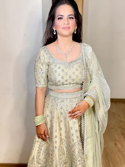 Deepti looking absolutely serene and beautiful for her sagan function in a light-colored lehenga.