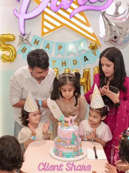 The birthday girl, Kuha, and her family about to cut her magical mermaid cake. It's a privilege to be part of these precious memories.