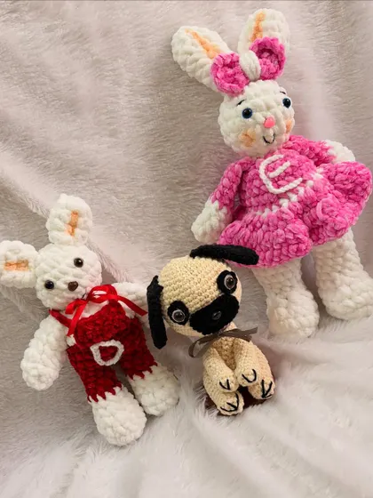 This trio of custom toys includes two plush bunnies and an adorable little pug, all handmade with love.