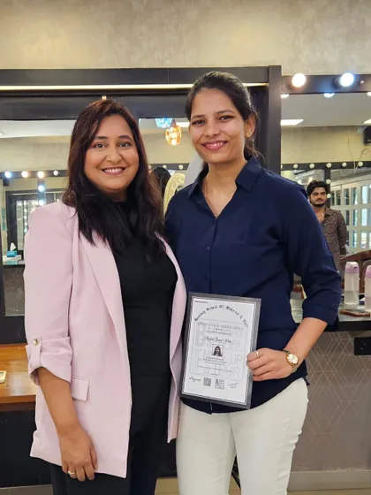 A proud moment with one of my newly certified professional artists. Her hard work and perseverance truly paid off.