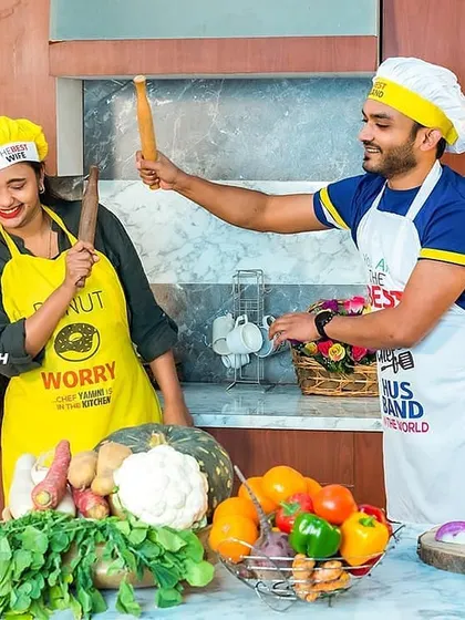 Capturing the fun, candid interactions between a couple is key to a successful pre-wedding shoot. Here, Prashast and Yamini share a laugh during their cooking-themed session.