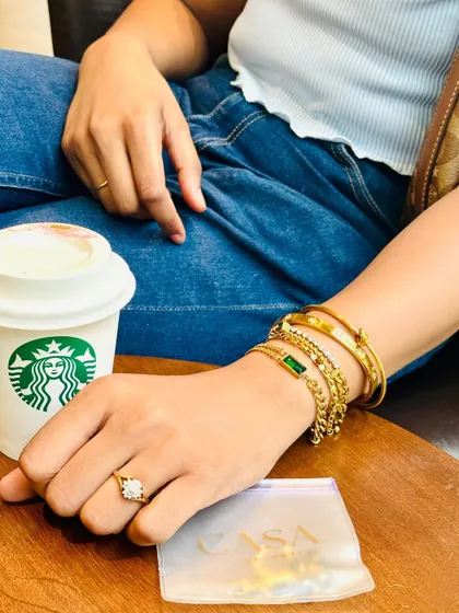 A lifestyle jewellery shoot showing how the pieces look in a real, everyday setting. This kind of in-context photography helps customers visualize themselves using the product, making it perfect for social media and blogs.