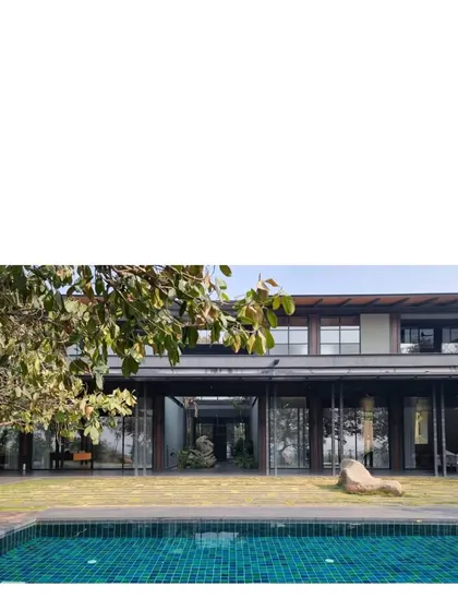 Our Lakeshore house on Lake Osman Sagar is a two story filter for breezes and views. The construct is a precise metal skeleton with rammed earth infill from the site itself, a method we chose to minimize disruption.
