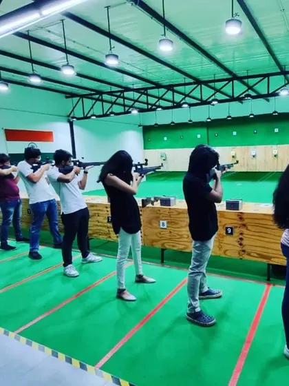 A Sunday session in full swing. You can see the concentration as each person takes aim down the 10-meter range. It's a mental sport as much as a physical one.