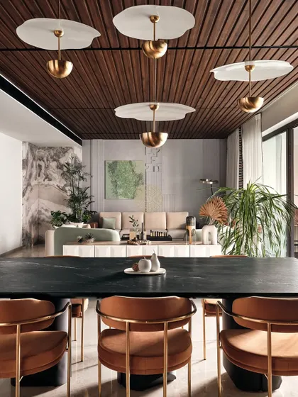 A view from the dining table back towards the living area. The open plan allows for easy conversation and movement between the two zones, perfect for a family that loves to entertain.