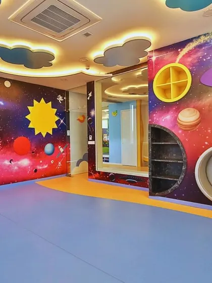 For the Supaksha Early Learning Habitat, we created a universe of imagination. This space-themed room features custom-built shelving and vibrant wall murals, designed to be an interactive and inspiring environment where children can learn and explore through play.