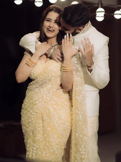 A quiet moment of connection amidst the celebration. These soulful shots are just as important as the high-energy ones.