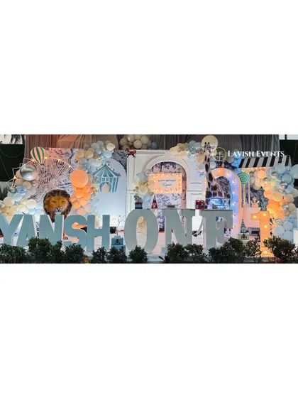 A panoramic shot of the impressive "KIYANSH ONE" stage setup, lit up for an evening celebration.