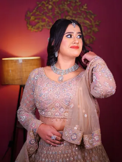Another close-up of the pastel peplum lehenga, highlighting the intricate embroidery.