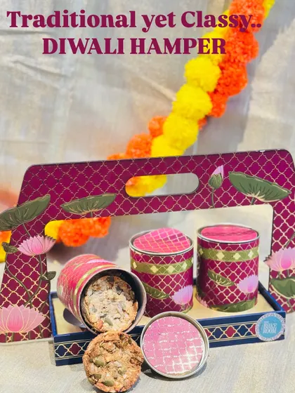 This is one of my premium Diwali hampers, designed to feel both traditional and classy. It features a beautiful lotus-themed tray and contains a selection of my bestsellers like 7-Seeds Nuts Cookies and Toasted Almond Stacks.