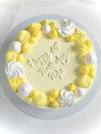 A bright and cheerful Pineapple Cake made for a 60th birthday celebration. I only use fresh pineapple, never canned, to ensure the most authentic and refreshing tropical flavor.