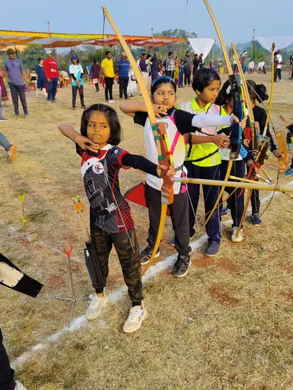 Our youth archery program starts with strong fundamentals. Here, young archers learn discipline and focus using traditional Indian wooden bows during a state competition.