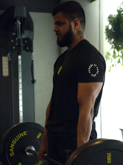 Our coach Vinay demonstrates proper form for a deadlift, a fundamental movement for building total-body strength.