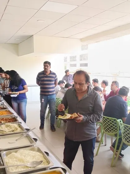 Employees enjoying a well-deserved lunch break with our catering service. We aim to make every corporate meal a positive and satisfying experience.
