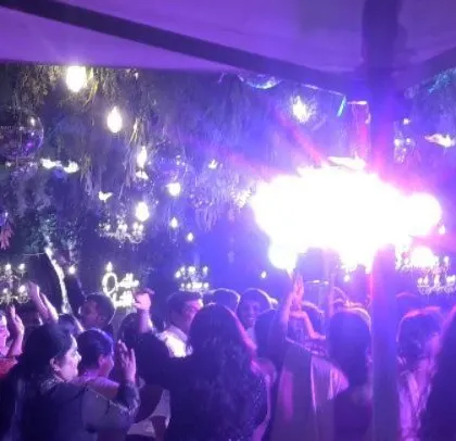 The flare creates a dramatic moment on the dance floor.