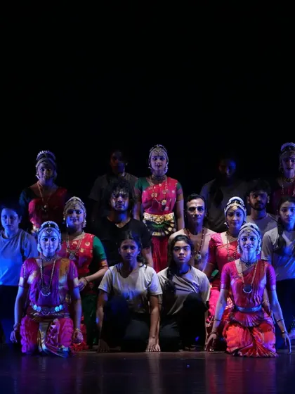 The full cast of "TATSAMA TADBHAVA" on stage, a production that brought together dancers from our company and the Chithkala School of Dance. The image shows a mix of contemporary and traditionally costumed performers.