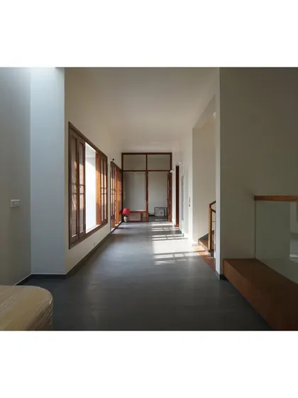 The interplay of light and the warm tones of the wood create a serene and inviting atmosphere.