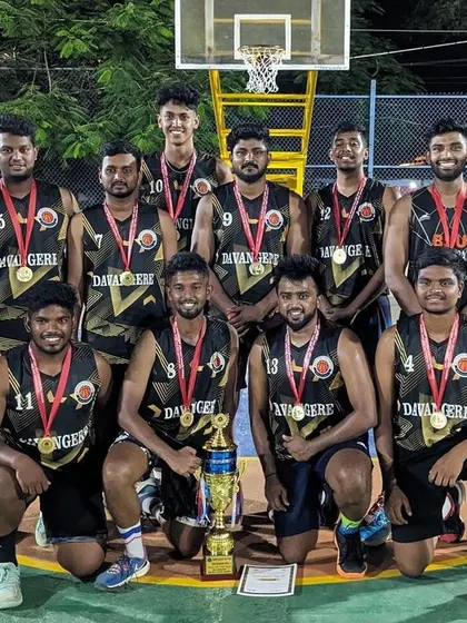 The Davangere team posing with our medals and runner-up trophy.