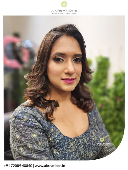 A polished and elegant look perfect for a reception or evening party. The makeup is defined yet soft, paired with classic voluminous curls.