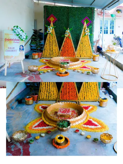 The beautiful and vibrant decor for a Haldi ceremony, featuring marigold flowers and traditional elements.