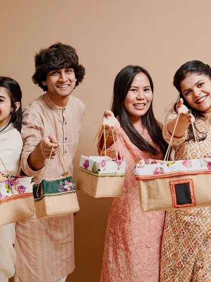 Our team showcasing a variety of our eco-friendly jute and Kauna bags. We believe in offering sustainable packaging options that are both stylish and practical.