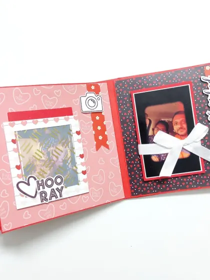 This page includes fun elements like a faux polaroid frame and a photo held in place with a delicate white bow, adding a touch of elegance.