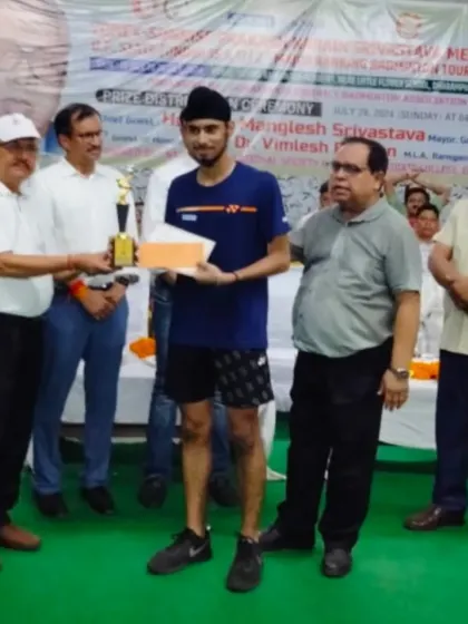 **Honoring a State Champion.** Ishmeet receiving his award for winning the U-17 Boys' Singles gold medal at the U.P. State tournament.
