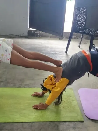 A duplicate of a partner downward dog and plank pose, a great exercise for building strength together.