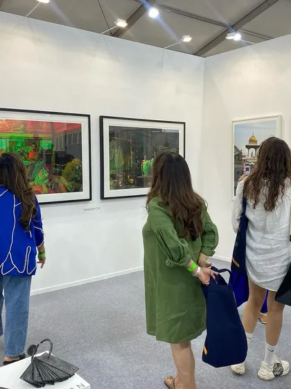 Visitors viewing the large photographic prints at our booth.