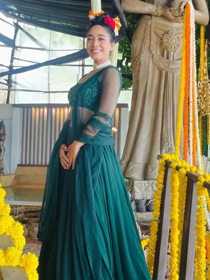 "The journey should be more beautiful than the destination." A serene moment captured in a beautiful green lehenga before an event.
