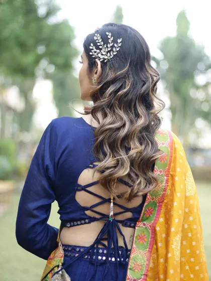 A back view of the classic Hollywood waves. We teach the specific techniques required to create these uniform, glossy waves that exude glamour and elegance.