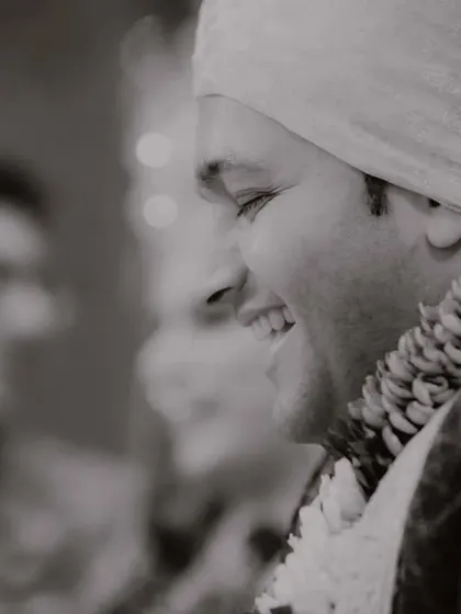 From laughter to love, we didn't miss a single moment of the groom's pure joy. A heartwarming black and white candid smile.