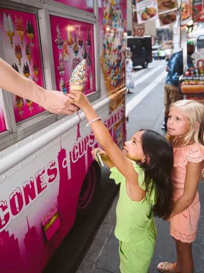 A classic NYC moment for a kids' summer campaign. The excitement of buying ice cream from a truck is a relatable story, and the lighting is bright and cheerful to match the mood.