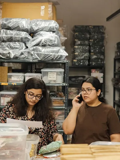 A real moment from the festive rush. Our team members juggling client calls and inventory checks to keep everything on track.